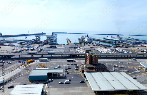 Busy Port of Dover docks . Cars and trucks with cargo queuing to embark ferry for channel crossing . photo