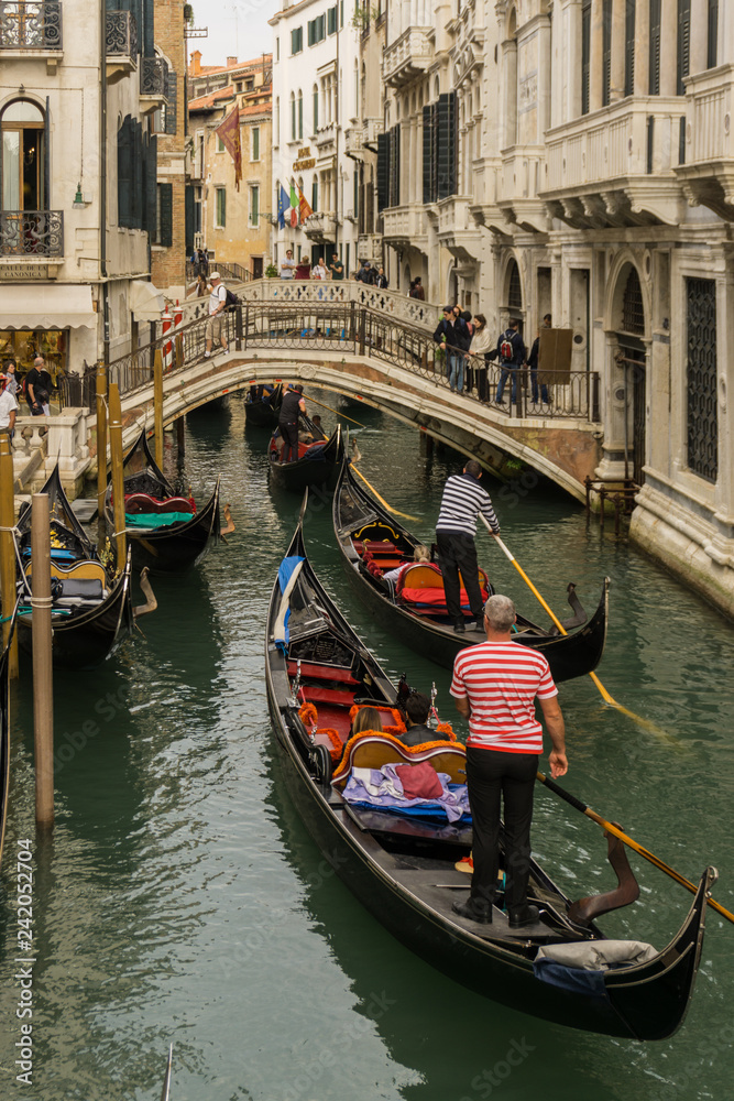 Venice gondolas under the bridge