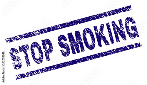 STOP SMOKING seal stamp with scratced style. Blue vector rubber print of STOP SMOKING text with grunge texture. Text title is placed between parallel lines.