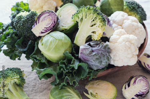 cruciferous vegetables, cauliflower,broccoli, Brussels sprouts, kale in wooden bowl, reducing estrogen dominance, ketogenic diet photo