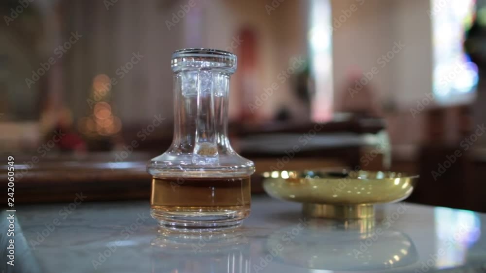 Catholic gifts sitting on table in church slow motion