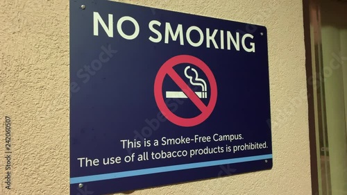 No Smoking sign on outside of hospital entrance photo