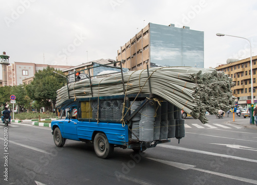 Overloaded truck with tubes