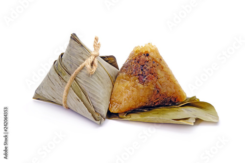 Sticky rice dumpling or Zongzi (Pyramid-shaped dumpling made by wrapping glutinious rice in bamboo leaves) for Chinese Boat dragon festival (5th Lunar month festvial. Isolated on white background. photo