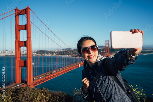 female tourist taking selfie in San Francisco