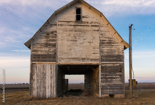 Old rustic barn as the sun sets.  Ogle County, Illinois, USA photo