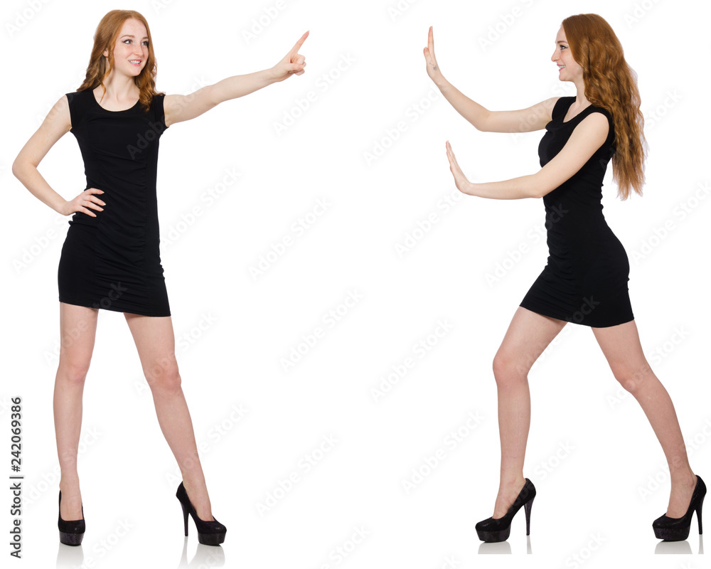 Young woman in black dress pressing virtual button Young woman in black dress pressing virtual button