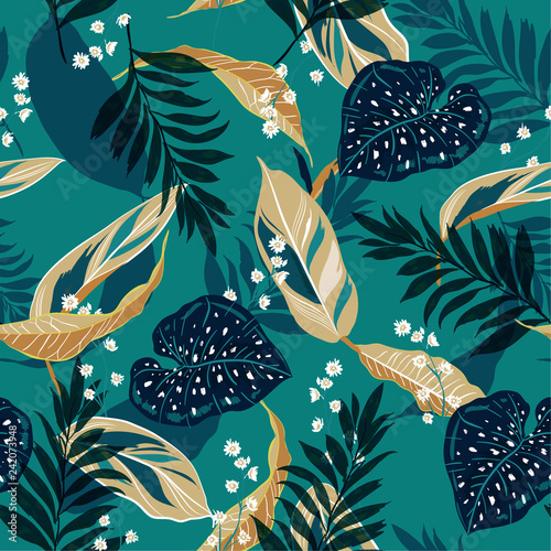 Beautiful tropical leaves. Seamless graphic design with palms leaves and flowers. Fashion,fabric and all prints