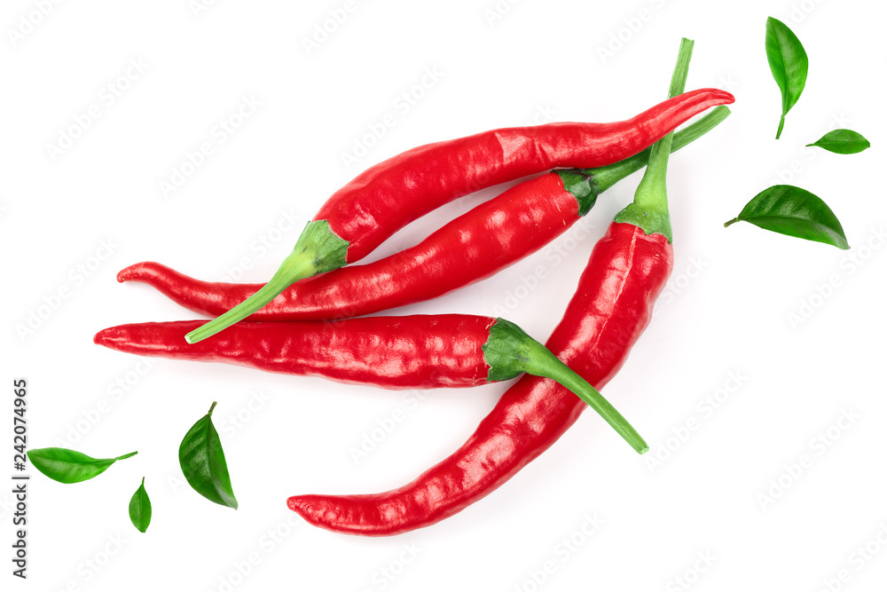 red hot chili peppers decorated with green leaves isolated on white background. Top view. Flat lay pattern