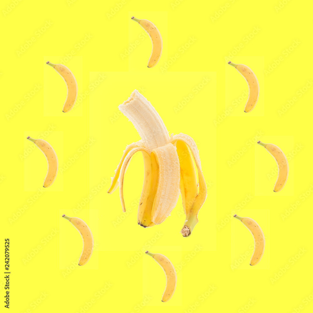 big banana circled by little bananas with yellow background big banana circled by little bananas with yellow background