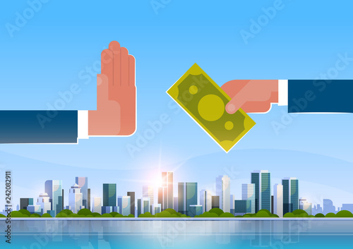 businessman refusing offered bribe offers money refusal hand gesture stop corruption concept over big modern city building skyscraper cityscape skyline flat horizontal