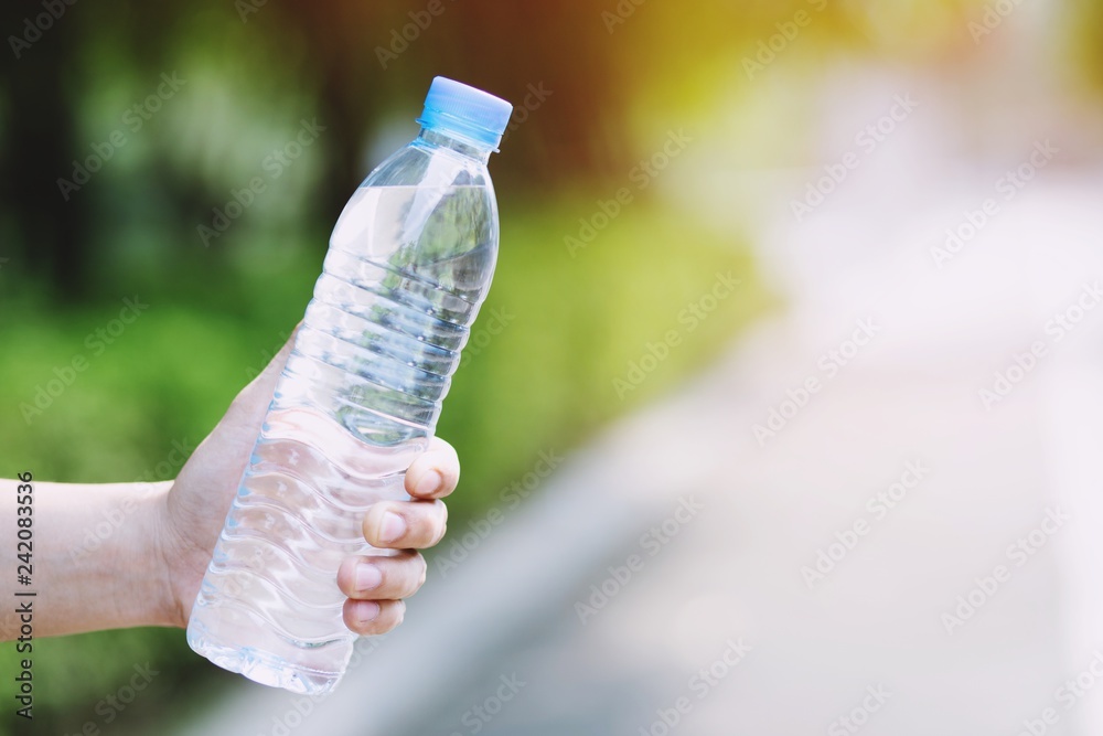 Close Up Young Man Hand Holding Fresh Drinking Cold Water Bottle