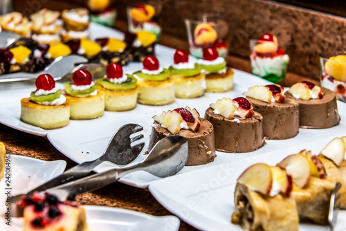Close up delicious dessert pastry cakes Fresh colourful sweet berry desserts, beautifull decorated in Egypt Makadi Bay photo