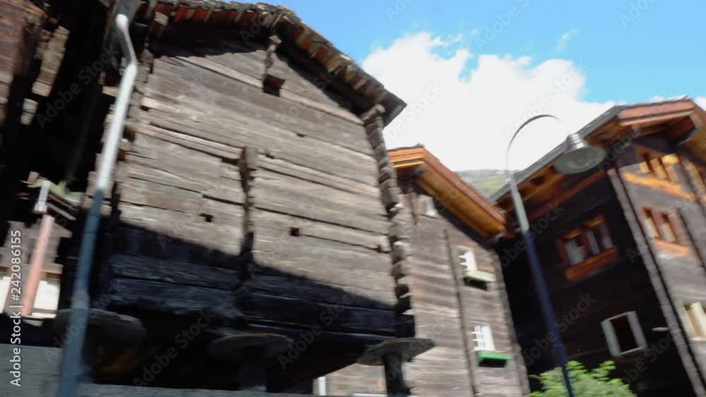 Traditional old wooden houses on stilts in southern part of Switzerland in Village of Zermatt Traditional old wooden houses on stilts in southern part of Switzerland in Village of Zermatt
