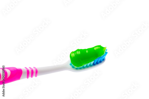 toothbrush and toothpaste on an isolated background