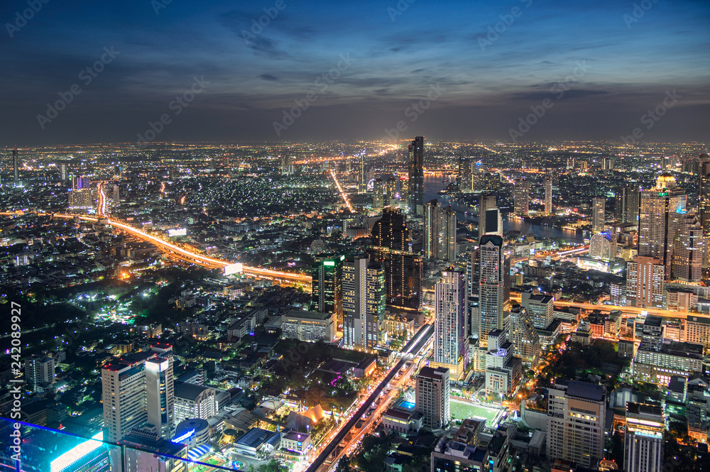 Cityscape of crowded building with light traffic at Bangkok city