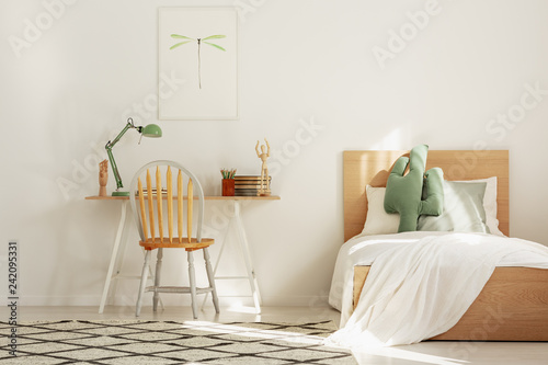White and wood scandinavian kid's room with bed and workspace