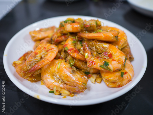 deep fried stir shrimp with chili and garlic on white dish