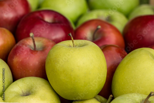 Close up of fresh golden, red and green apples