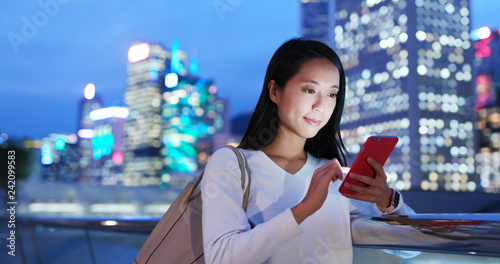 Canvas Print Woman use cellphone online at night