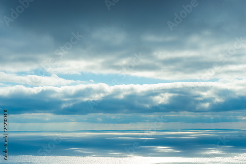 The majestic sky and sea, the view of the horizon and blue clouds over the water