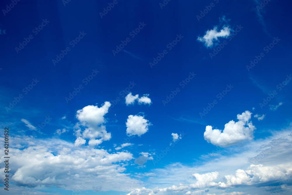blue sky background with tiny clouds blue sky background with tiny clouds