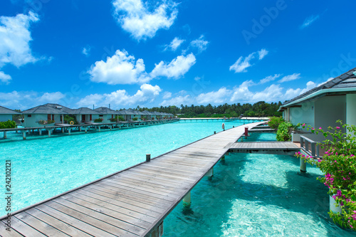 Maldives water bungalow on ocean water landscape