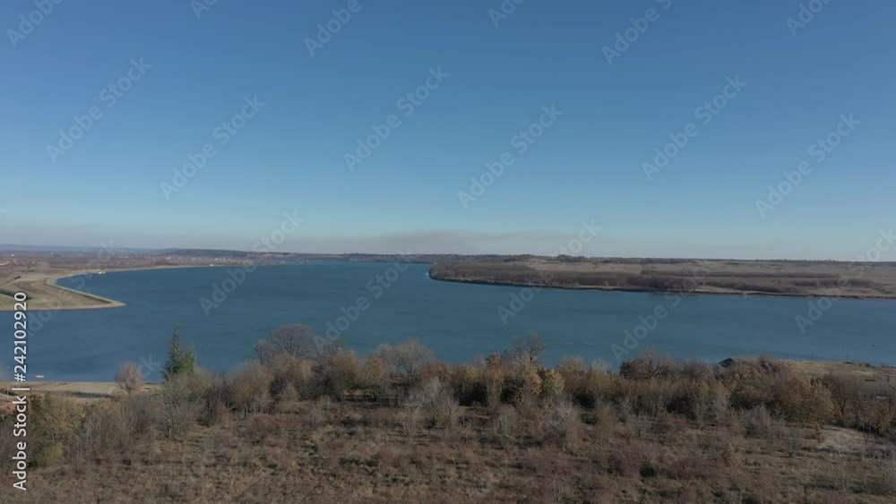 Slow flight to river Danube flow 4K aerial footage