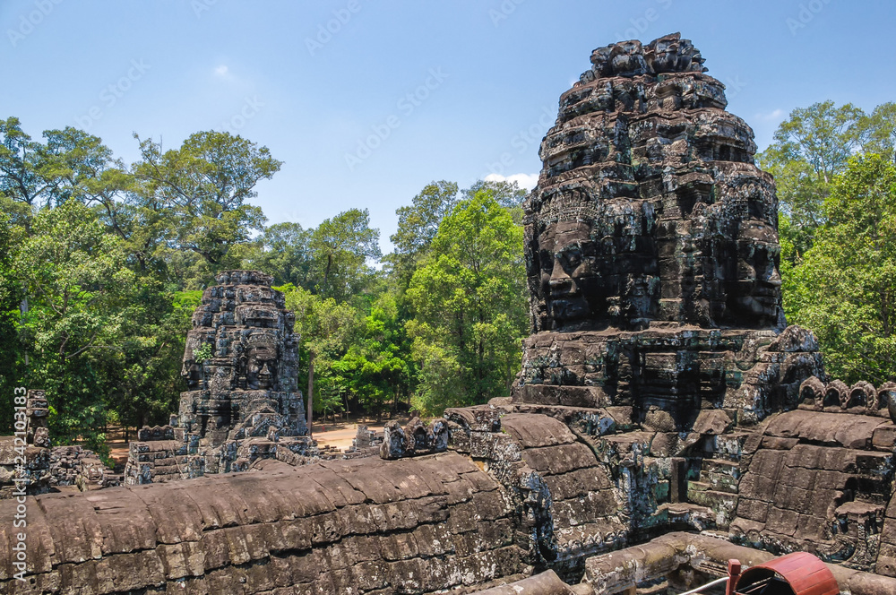 Anciente stone heads in Bayon temple in Angkor Wat, Cambodia.
