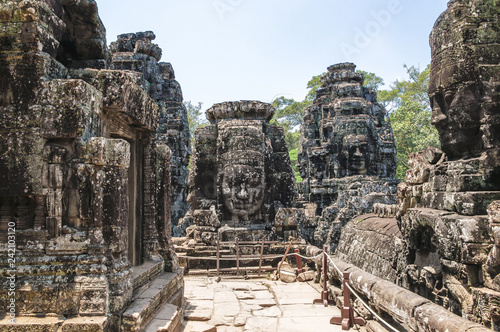 Anciente stone heads in Bayon temple in Angkor Wat, Cambodia. photo