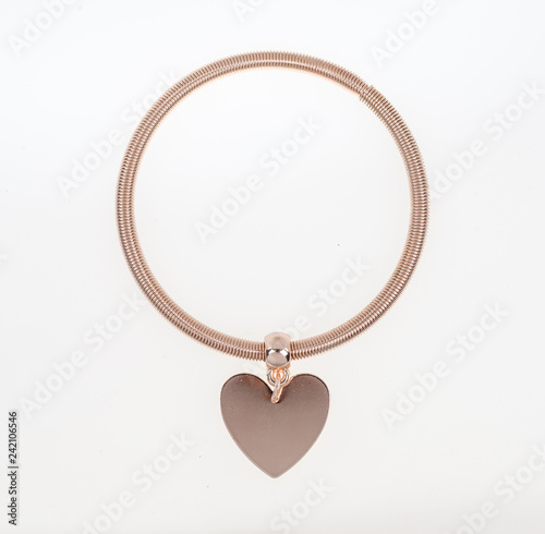 Rose pink heart braclet isolated against white background