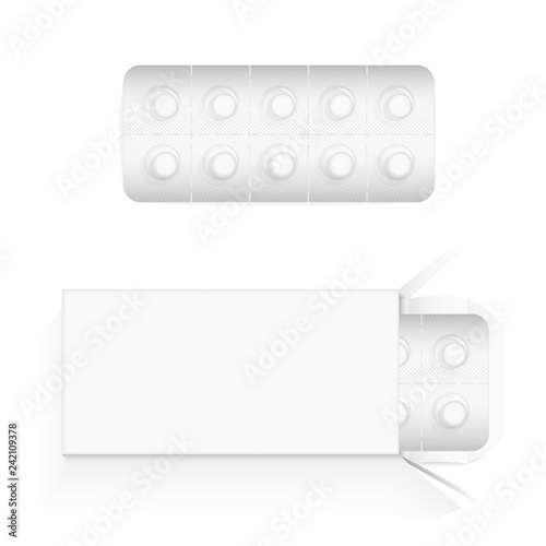 White round pills in a blister. Open cardboard packaging with a blister inside. Place for text or brand.