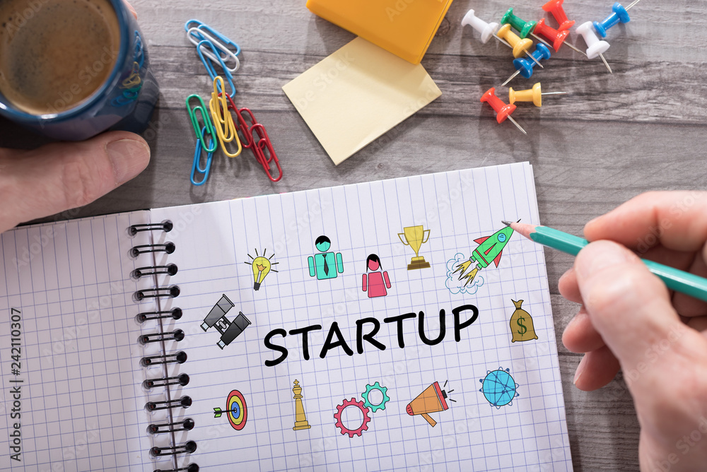 Startup concept on a notepad Startup concept on a notepad