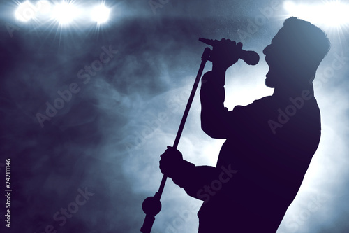 Singer singing silhouette photo