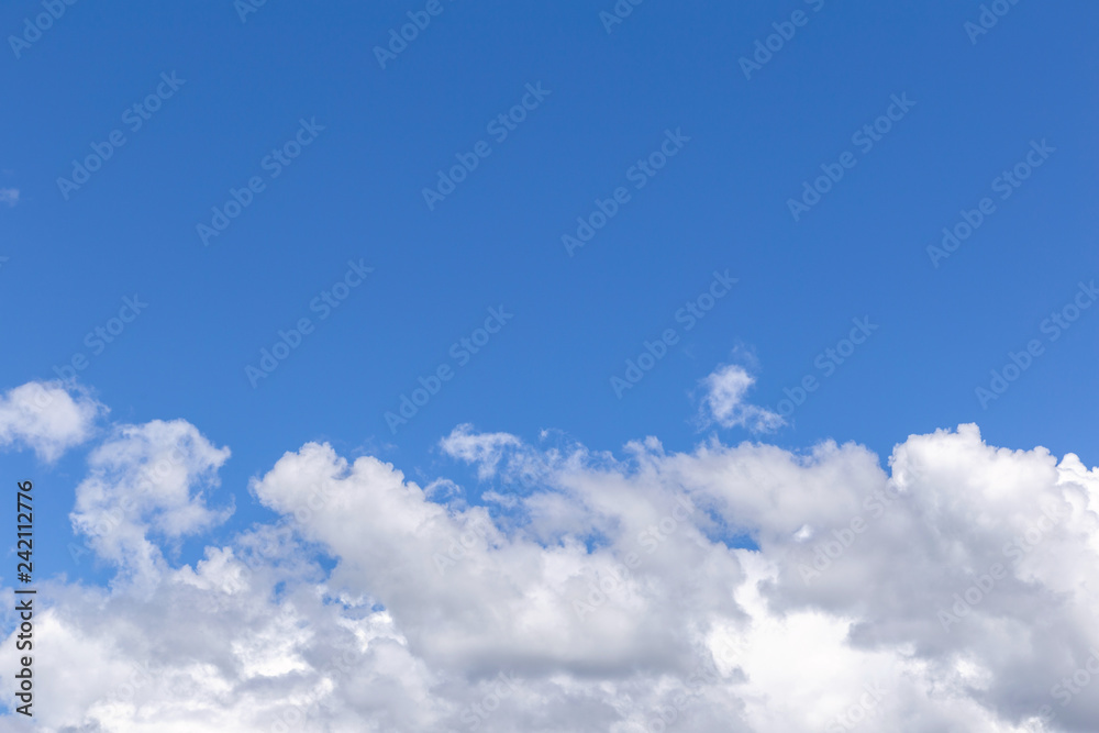 Blue sky background with white clouds, rain clouds on sunny summer or spring day. Blue sky background with white clouds, rain clouds on sunny summer or spring day.