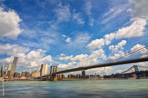 Brooklyn bridge, Hudson river and the island of Manhattan, New York skyline, USA