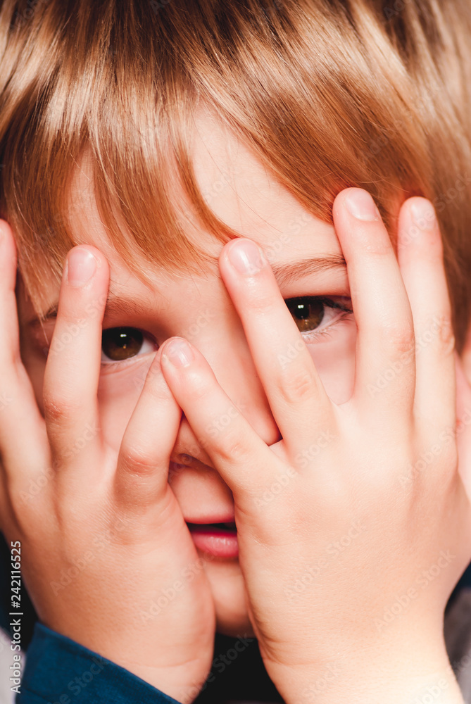 little child with hands on the face - sensory connections little child with hands on the face - sensory connections