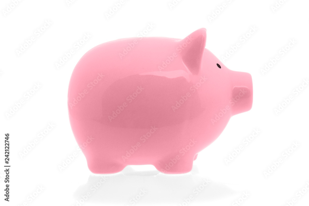 Ceramic pink piggy bank on white background