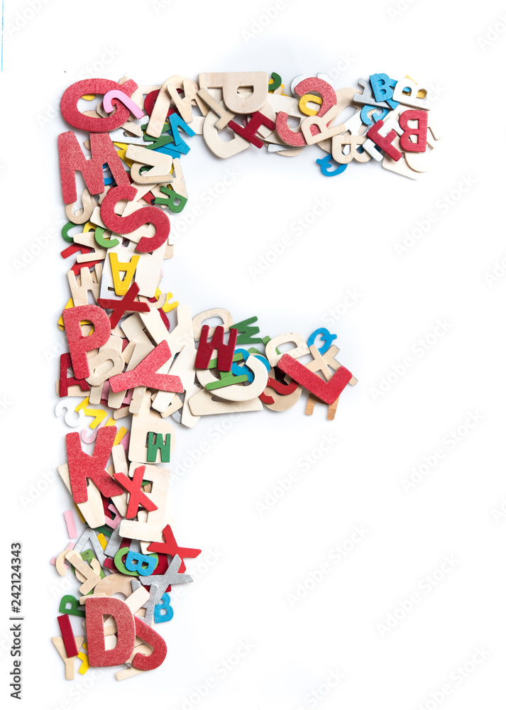 Obraz premium Colorful wood alphabet letters on white background,letter F