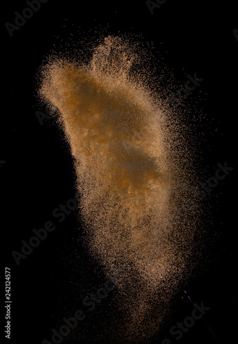 Sandy explosion isolated on over dark background,Abstract sand cloud,Motion blur