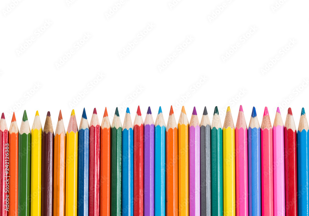 Painting hobby and creativity presented by color pencils set on white Painting hobby and creativity presented by color pencils set on white