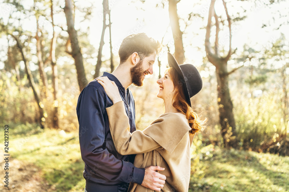 Happy young romantic couple spend time together outdoor. Happy young romantic couple spend time together outdoor.