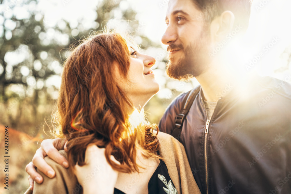 Fototapeta premium Happy young romantic couple spend time together outdoor.