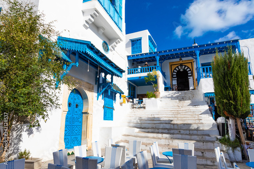 Cityscape with typical white blue colored houses in resort town Sidi Bou Said. Tunisia. photo