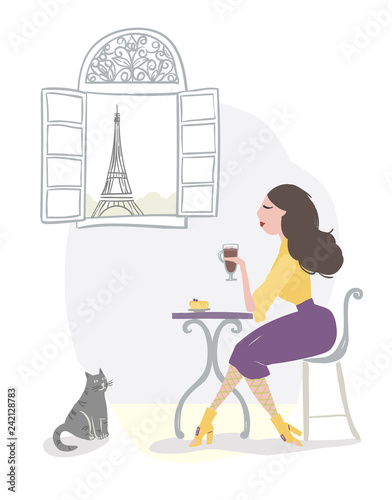 Girl drinking coffee in a parisian cafe