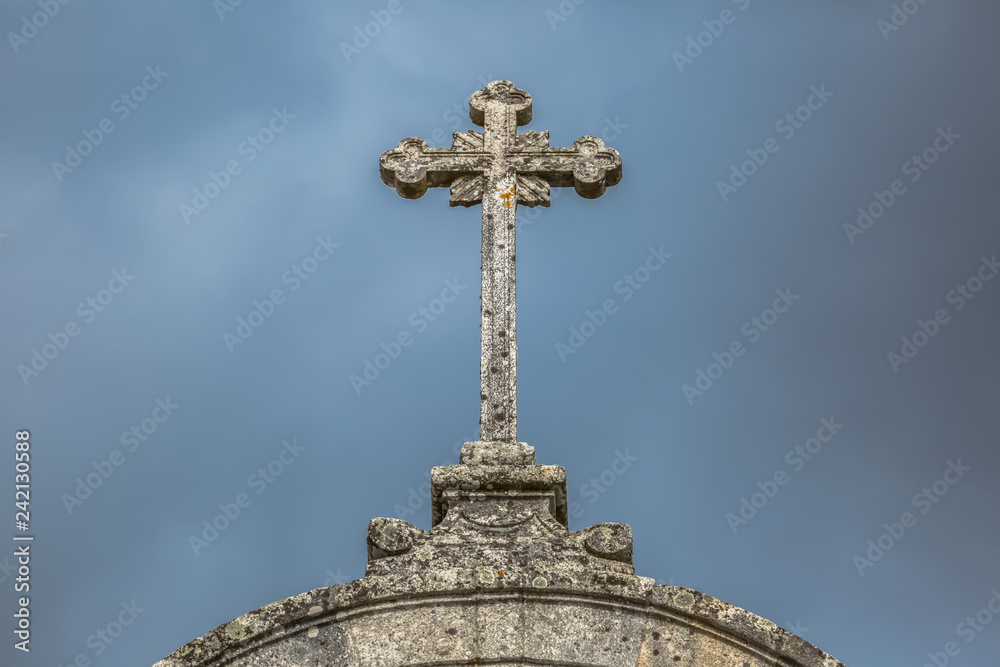 Detailed view at the stone crucifix sculpture