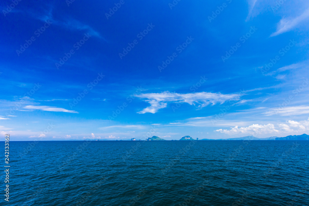 Blue Seawater with sea foam as background