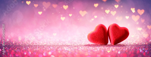 Fotografie, Obraz Two Hearts On Pink Glitter In Shiny Background - Valentine's Day Concept