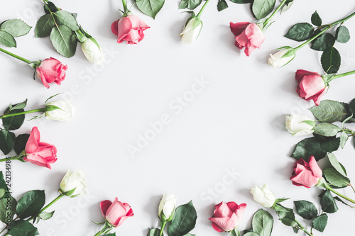 Flowers composition. Pink and white rose flowers on pastel gray background. Flat lay, top view, copy space