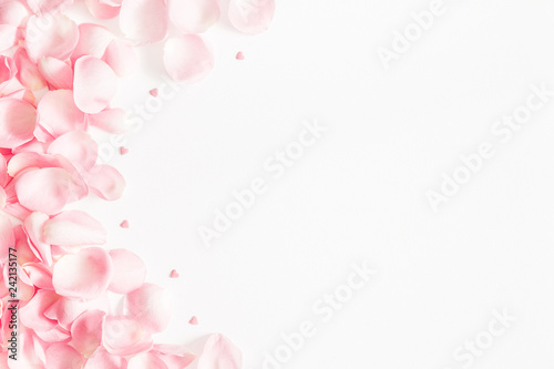 Flowers composition. Rose flower petals on white background. Valentine's Day, Mother's Day concept. Flat lay, top view, copy space